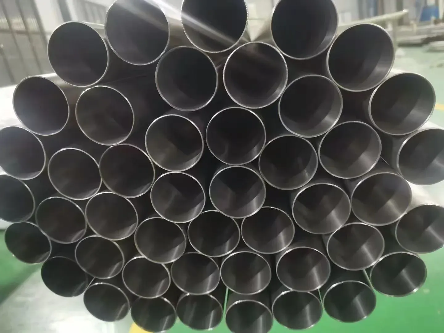 Close-up of titanium tube ends showing internal and external surfaces.