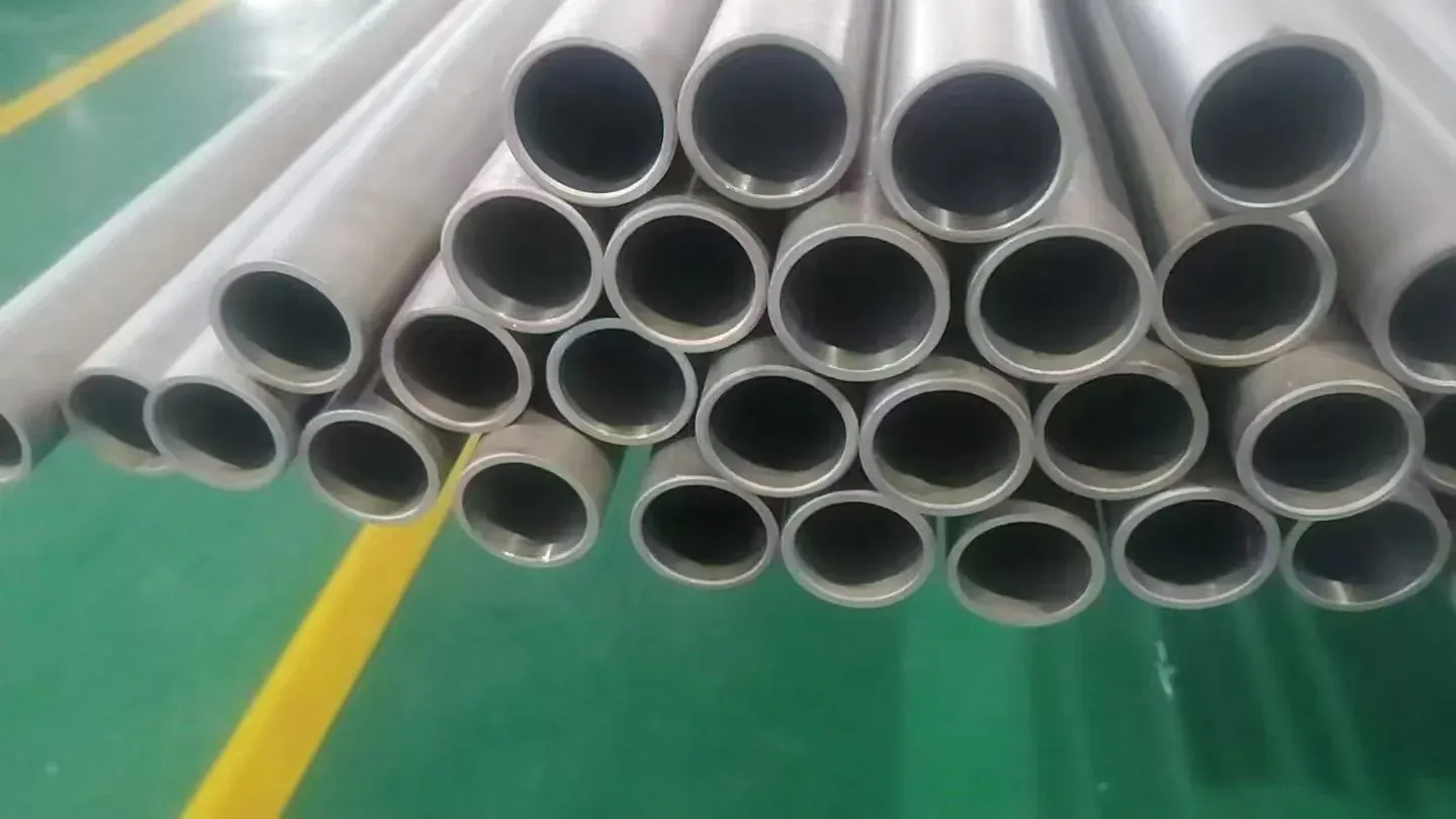 Titanium tube ends arranged for inspection and handling.